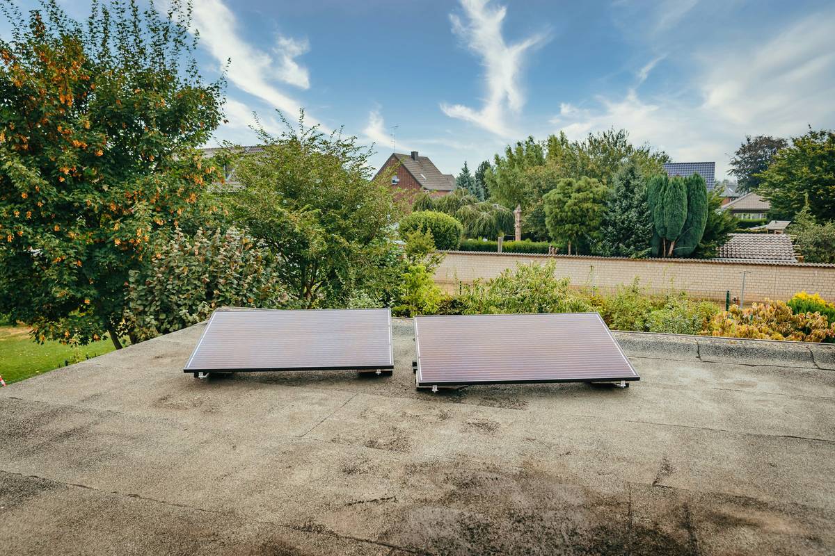 energy solar panels global with visible dust accumulation on residential rooftop installation