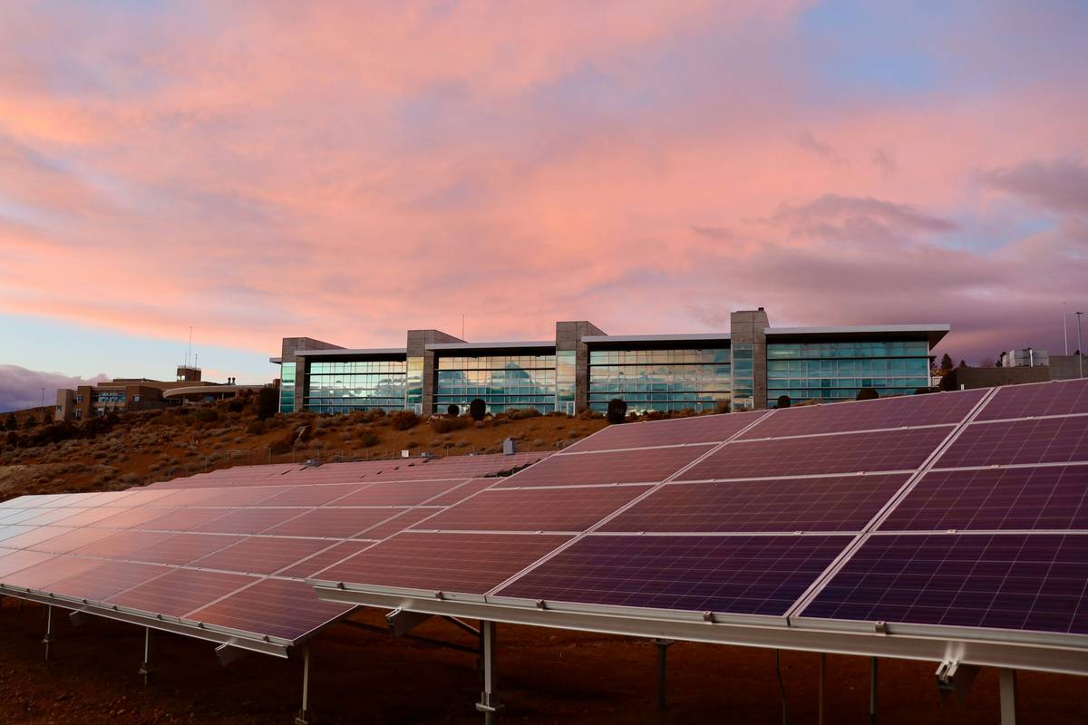 Close-up of dusty solar panels with reduced solar panel energy density due to accumulated grime